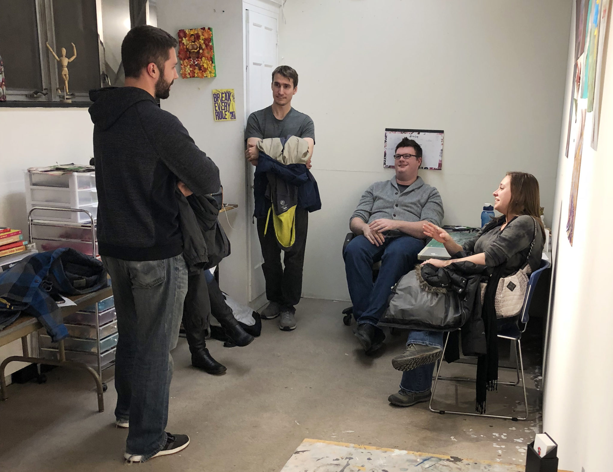 Student Kyle Voss engaging with studio visitors at Open Studio Night 2019