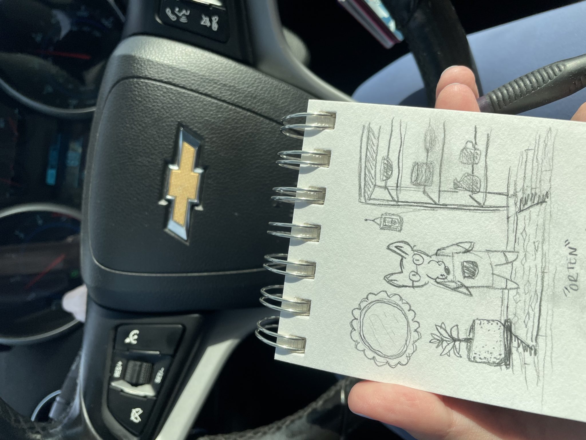 sketching in a car